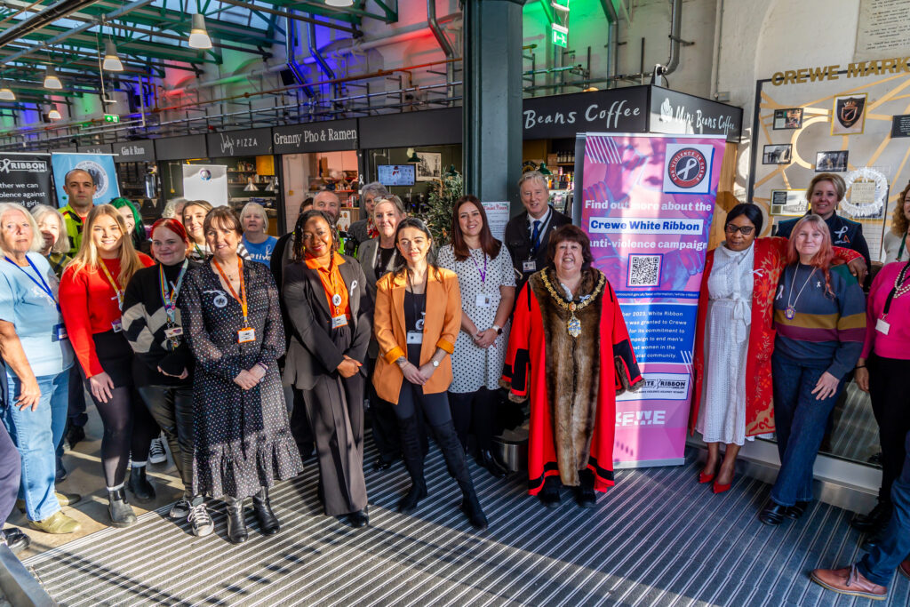 Group photograph of attending organisations at the White Ribbon Week event